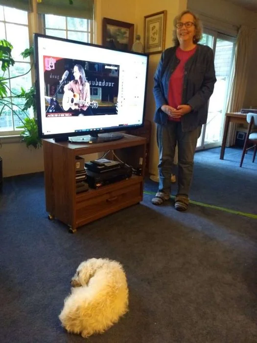 Julie McCullough and Dixie watching Glen's livestream